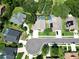 Aerial view of the property showcasing its backyard pool and proximity to surrounding neighborhood amenities at 1969 Crystal Downs Ct, Oviedo, FL 32765