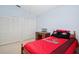 Bedroom featuring two closets and a sports themed bedspread and pillows at 1969 Crystal Downs Ct, Oviedo, FL 32765