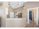 Kitchen featuring granite countertops, stainless steel appliances, and pendant lighting over the bar at 1969 Crystal Downs Ct, Oviedo, FL 32765