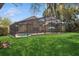 View of a beautiful screened in lanai, backyard, and pool area that is perfect for relaxation and entertainment at 1969 Crystal Downs Ct, Oviedo, FL 32765