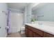 Well-lit bathroom with a shower-tub combo, updated vanity, and neutral color scheme at 1978 Fishtail Fern Way, Ocoee, FL 34761