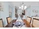 Stylish dining area blends seamlessly with a modern kitchen, perfect for dining at 1978 Fishtail Fern Way, Ocoee, FL 34761