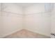 Walk-in closet featuring an open-wire shelving system and neutral walls at 2024 Sw 153Rd Loop, Ocala, FL 34473