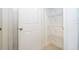 Walk-in closet features white wire shelving for optimal storage solutions at 2024 Sw 153Rd Loop, Ocala, FL 34473