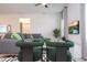 Cozy living room with modern furnishings, neutral colors, and a mounted flat screen television at 2024 Sw 153Rd Loop, Ocala, FL 34473