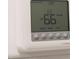 Digital thermostat showing indoor temperature set to 66 degrees and fan on automatic at 2024 Sw 153Rd Loop, Ocala, FL 34473