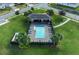 Aerial view of the community pool and amenities, surrounded by well-maintained landscaping at 2539 Auburn Ridge Dr, Apopka, FL 32712