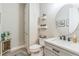 Powder room featuring updated vanity, faucet and fixtures, plus stylish decor elements at 2539 Auburn Ridge Dr, Apopka, FL 32712