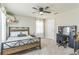 Stylish bedroom with a ceiling fan, plenty of natural light, and modern decor at 2539 Auburn Ridge Dr, Apopka, FL 32712