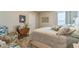 Bright bedroom featuring a side table, bedside table, and comfortable furnishings at 2539 Auburn Ridge Dr, Apopka, FL 32712