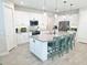 Bright kitchen with stainless steel appliances, pendant lights, and a stylish tile backsplash at 2539 Auburn Ridge Dr, Apopka, FL 32712
