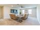 Comfortable living room featuring a ceiling fan, TV, and cozy seating on plush carpeting at 2539 Auburn Ridge Dr, Apopka, FL 32712