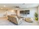 Relaxing living area featuring large-screen TVs, comfortable seating, and neutral décor at 2539 Auburn Ridge Dr, Apopka, FL 32712