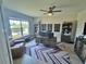 Office featuring a wooden desk, a leather chair, and two bookcases at 2539 Auburn Ridge Dr, Apopka, FL 32712