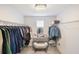Organized walk-in closet with ample shelving, hanging space, and a central vanity at 2539 Auburn Ridge Dr, Apopka, FL 32712
