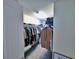 Neat walk-in closet offering extensive storage with organized hanging and shelving units at 2539 Auburn Ridge Dr, Apopka, FL 32712