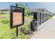 Community mailboxes are conveniently located near the entrance, surrounded by landscaped greenery at 26271 Feathergrass Cir, Leesburg, FL 34748