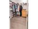 Spacious walk-in closet features ample shelving and storage space at 26271 Feathergrass Cir, Leesburg, FL 34748