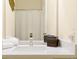 Bathroom features white cabinets and quartz countertops, as well as a shower at 2648 Daulby St, Kissimmee, FL 34747