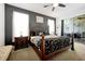 Bedroom featuring decorative bedding and a sliding glass door to the pool at 2648 Daulby St, Kissimmee, FL 34747