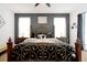 Main bedroom featuring decorative pillows and bedding at 2648 Daulby St, Kissimmee, FL 34747