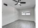 Bedroom with a ceiling fan, closet, neutral paint, and lots of natural light at 2736 Shannon Rd, Orlando, FL 32806