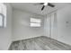 Bedroom with a ceiling fan, closet, neutral paint, and a window at 2736 Shannon Rd, Orlando, FL 32806
