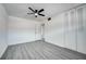 Bedroom featuring neutral paint, modern ceiling fan, and a closet at 2736 Shannon Rd, Orlando, FL 32806