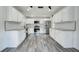 Modern kitchen equipped with stainless steel appliances, new cabinets and sleek countertops at 2736 Shannon Rd, Orlando, FL 32806