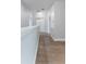 Hallway featuring hard surface floors, neutral walls and access to other rooms at 275 Lakeshore Dr, Davenport, FL 33837