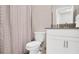 Cozy bathroom with a shower and tub combination and a white vanity for ample storage space at 2821 Bookmark Dr, Kissimmee, FL 34746