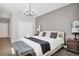 Beautiful bedroom with a decorative chandelier, a neutral palette, and wood-look floors at 2821 Bookmark Dr, Kissimmee, FL 34746