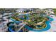Aerial view of an amazing community waterpark with lazy river, slides, and mini-golf at 2821 Bookmark Dr, Kissimmee, FL 34746
