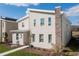 Modern two-story home boasting a contemporary design and landscaped front yard at 2836 Simile St, Kissimmee, FL 34746
