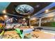 Game room with Star Wars themed mural, pool table and unique ceiling at 2836 Simile St, Kissimmee, FL 34746