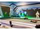 Game room showing the hockey table, a pool table, and space-themed wall decor at 2836 Simile St, Kissimmee, FL 34746