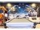 Game room with mural and pool table at 2836 Simile St, Kissimmee, FL 34746