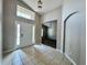 Inviting entryway with tiled flooring, high ceilings, and natural light creates a great first impression at 3049 Buckeye Pointe Dr, Winter Haven, FL 33881