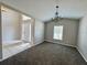 Bright and spacious living room with neutral paint, carpet, and plenty of natural light at 3049 Buckeye Pointe Dr, Winter Haven, FL 33881