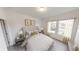 Cozy bedroom featuring a comfortable bed, soft lighting, and a serene atmosphere at 3251 Nightfall Rd, Winter Haven, FL 33881