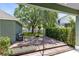 Relaxing backyard features a wooden deck, a shaded area, and privacy with green shrubbery at 3813 Goldenglow Dr, Orlando, FL 32828