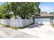 A lovely home with a two-car garage and a white picket fence enhancing curb appeal at 3813 Goldenglow Dr, Orlando, FL 32828