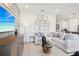 Bright living room showcasing a comfortable sofa, modern coffee table, and stylish wall art at 439 Shoreview Sands Ave, Mascotte, FL 34753