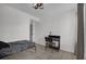 This bedroom features tile floors and a cozy atmosphere for relaxation and rest at 4400 Thornbriar Ln # 104, Orlando, FL 32822