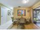 Cozy dining area with access to the lanai at 4519 Se 140Th Pl, Summerfield, FL 34491
