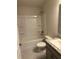Well-lit bathroom with a combination tub and shower, along with a stylish vanity and sink at 4586 Se 25Th Loop, Ocala, FL 34480