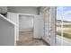 Inviting entryway featuring stylish flooring and bright french doors, welcoming you into the home at 4905 Pall Mall E St, Kissimmee, FL 34758