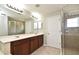 This spacious bathroom features dual sinks, a walk-in shower, and a private toilet area at 506 Harbor Winds Ct, Winter Springs, FL 32708
