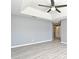 The gray bedroom offers neutral walls, providing a blank canvas for customization, complemented by sleek gray flooring at 506 Harbor Winds Ct, Winter Springs, FL 32708