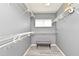The closet has built-in shelving with a bench at 506 Harbor Winds Ct, Winter Springs, FL 32708